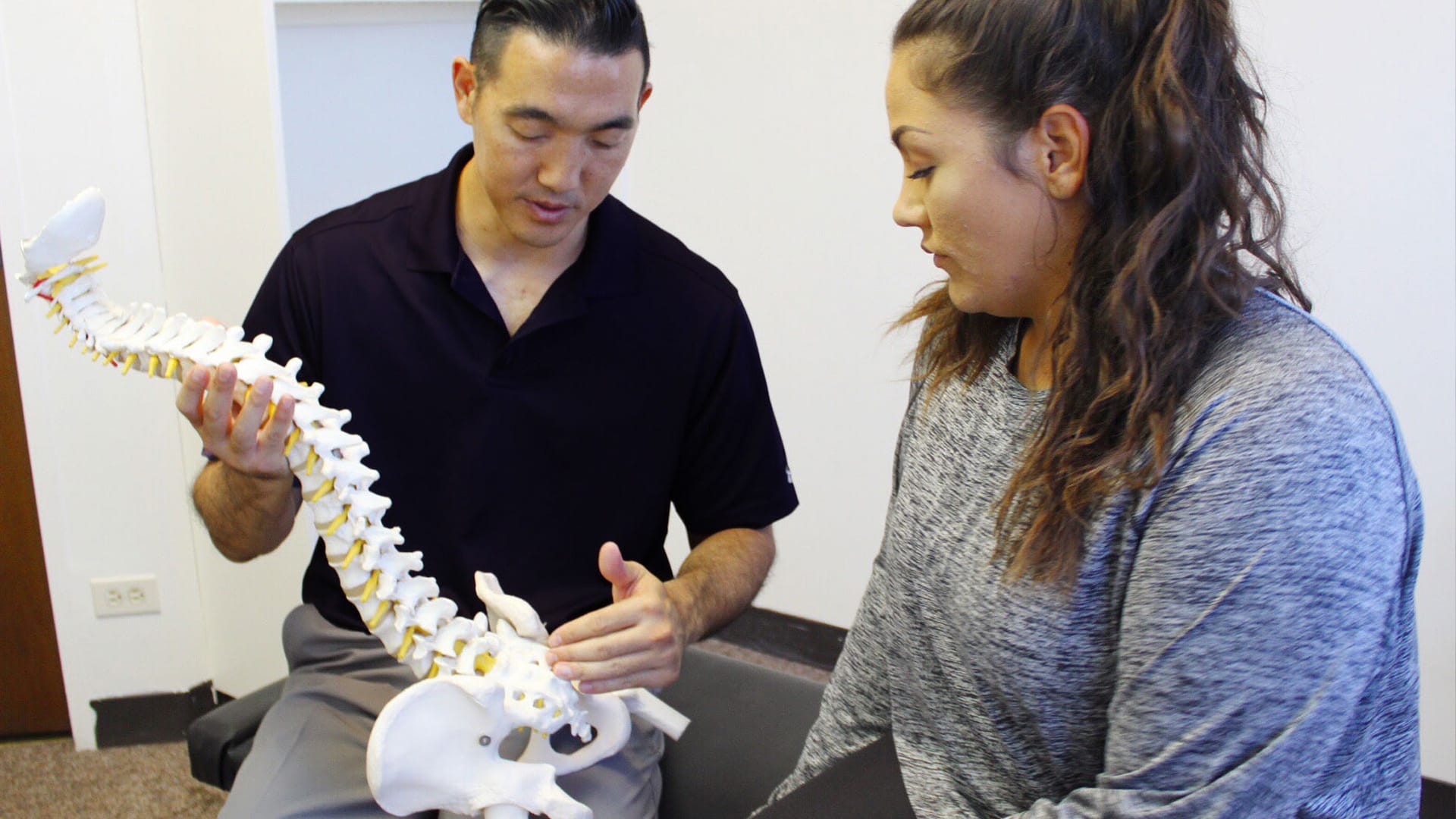 Dr Shaun giving a consultation to a patient