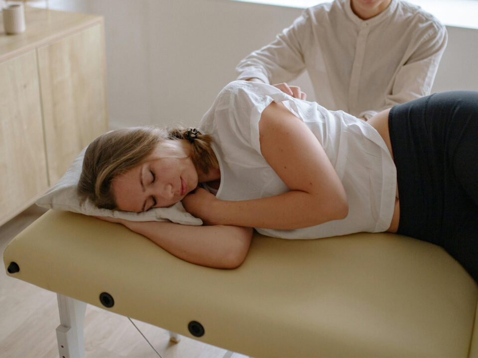 Woman at Chiropractor getting back adjustment