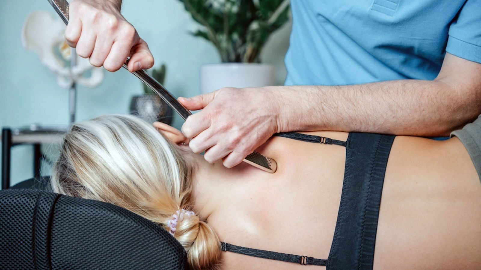 A chiropractor using the graston technique